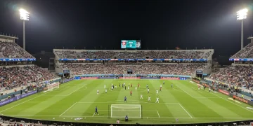 Concacaf Champions Cup 2025 Semifinal: 4 Tactical Moments Panoramic view of a Concacaf Champions Cup 2025 semifinal match under stadium lights.