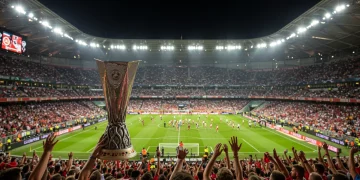 UEFA Europa League trophy in a crowded stadium at night